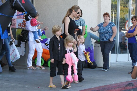 Angelina Jolie takes the kids out to shop for their Halloween costumes at a local Party City Store in Studio City, Los Angeles, CA, USA on October 28, 2012. The 37-year-old actress held tightly onto her twins, Vivienne Marcheline Jolie-Pitt and Knox Léon Jolie-Pitt, while her older daughter Shiloh Nouvel Jolie-Pitt picked out her own accessories. Photo by GSI/ABACAPRESS.COM29/10/2012 - Los Angeles