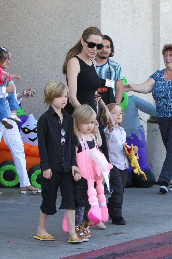 Angelina Jolie takes the kids out to shop for their Halloween costumes at a local Party City Store in Studio City, Los Angeles, CA, USA on October 28, 2012. The 37-year-old actress held tightly onto her twins, Vivienne Marcheline Jolie-Pitt and Knox Léon Jolie-Pitt, while her older daughter Shiloh Nouvel Jolie-Pitt picked out her own accessories. Photo by GSI/ABACAPRESS.COM29/10/2012 - Los Angeles