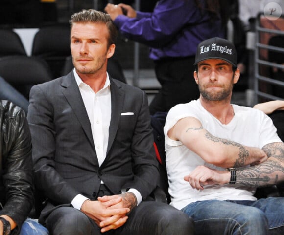 David Beckham et Adam Levine assistent à un match de basket des Lakers, à Los Angeles, le 30 octobre 2012