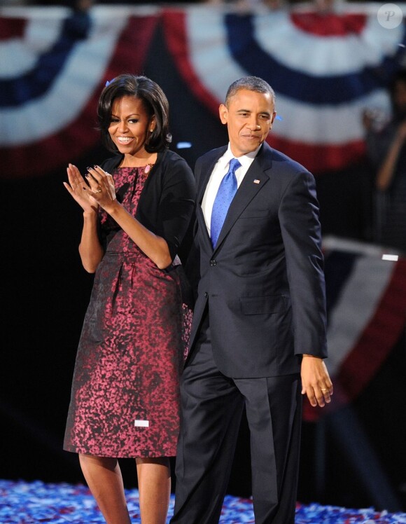 Barack Obama entouré de son épouse Michelle et de leurs filles Malia et Sasha au McCormick Place à Chicago, le 6 novembre 2012.