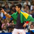 Novak Djokovic a passé quelques jours à Rio en compagnie de Gustavo Kuerten, entre match exhibition et inauguration de courts de tennis dans les Favelas, le 17 novembre 2012