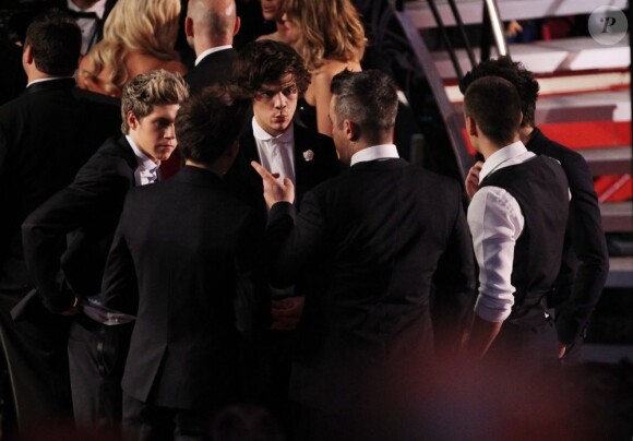 Les One Direction reçus par la reine Elizabeth II à Londres le 19 novembre 2012.