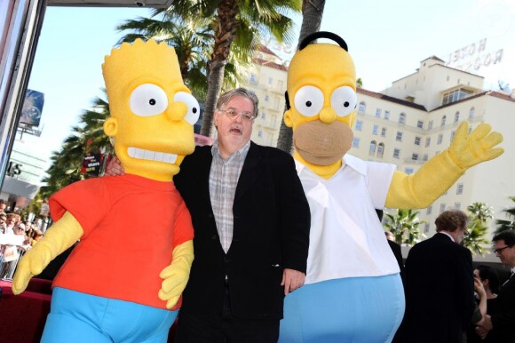 Matt Groening, accompagnés de Bart et son père Homer sur le Hollywood Walk of Fame, le 14 février 2012.