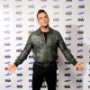 Robbie Williams annonce une tournée européenne des stades à Londres le 26 novembre 2012.