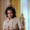 Michelle Obama a dévoilé les décorations de Noël de la Maison Blanche en présence d'enfants de militaires et fait un discours le 28 novembre 2012 à Washington.