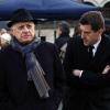 Pierre Bergé et Matthieu Pigasse assistent aux obsèques de Erik Izraelewicz, ancien directeur du journal Le Monde, au Père Lachaise à Paris, le 4 decembre 2012.