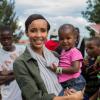 Sonia Rolland était en voyage humanitaire au Rwanda, son pays d'origine, fin novembre - début décembre 2012 pour le compte de son association Maïsha Africa. Elle tient ici dans ses bras la petite Ornella, 2 ans, abandonnée par sa mère et qui est atteinte d'une maladie grave.