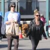Ashley Tisdale et son boyfriend Christopher French après leur séance de course à Whole Foods à West Hollywood le 3 janvier 2012