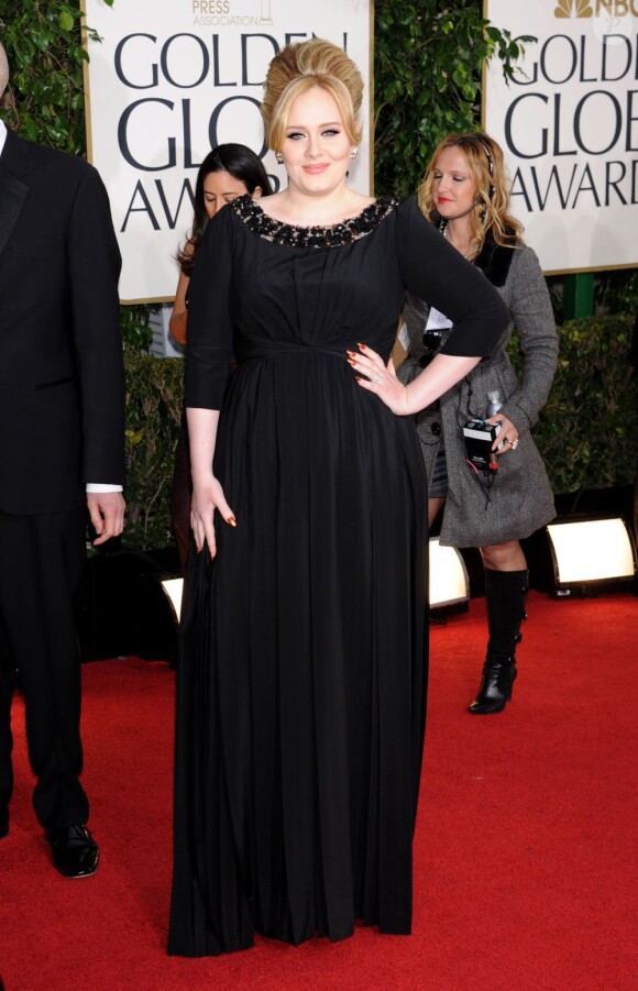 Adele à la 70e cérémonie des Golden Globes à Los Angeles le 13 janvier 2013. Elle a donné naissance à un petit garçon le 19 octobre 2012.