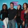 Fifth Harmony et Simon Cowell à la conférence de presse pour la dernière saison de l'émission X Factor à Los Angeles, le 17 décembre 2012.