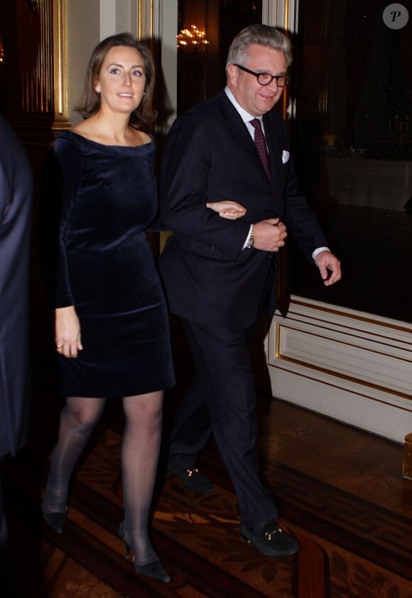 Le prince Laurent de Belgique et la princesse Claire au concert de Noël au palais royal de Bruxelles, le 19 décembre 2012.