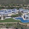 Vue aérienne, en avril 2012, du véritable palais dans lequel vivent Gisele Bündchen, Tom Brady et leurs enfants, à Brentwood, Los Angeles. Un terrain à onze millions de dollars, une maison à vingt...