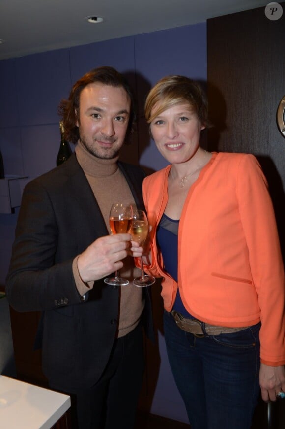 Alexandre Devoise et Estelle Martin lors de la galette des rois au show room de Nicolas Feuillatte à Paris - février 2013