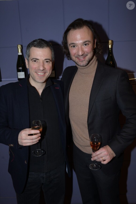 Bruno Putzulu et Alexandre Devoise lors de la galette des rois au show room de Nicolas Feuillatte à Paris - février 2013