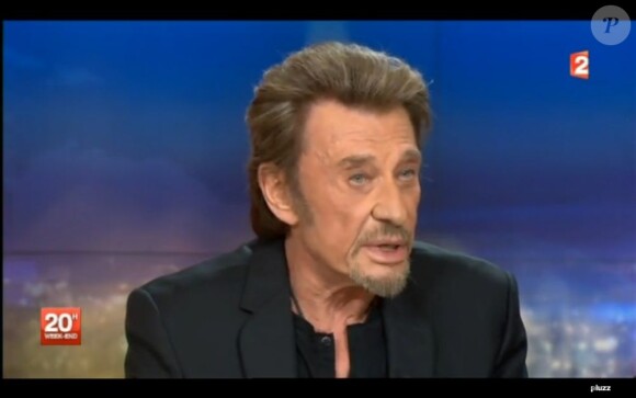 Johnny Hallyday et Amanda Sthers invités par Laurent Delahousse sur le plateau du 20 heures de France 2, le 9 février 2013.