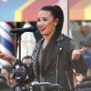 Demi Lovato chante à l'ouverture du magasin Topshop à The Grove à Los Angeles, le 14 février 2013.