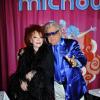 Michou prend la pose au côté de Régine lors de la soirée Regine's Birthday afin de célébrer les 83 ans de Régine. La soirée s'est déroulée dans le cabaret de Michou à Paris, le 12 février 2013.