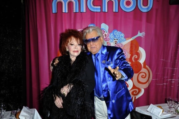 Michou prend la pose au côté de Régine lors de la soirée Regine's Birthday afin de célébrer les 83 ans de Régine. La soirée s'est déroulée dans le cabaret de Michou à Paris, le 12 février 2013.