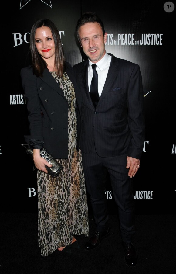 David Arquette et la belle girlfriend Christina McLarty à la soirée Hollywood Domino and Bovet 1822 Gala Benefiting Artists For Peace And Justice, à Los Angeles, le 21 février 2012.