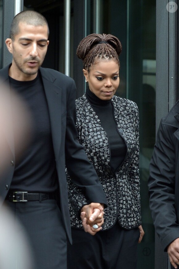 Janet Jackson et son mari Wissam Al Mana au défilé Armani lors de la Fashion Week de Milan, le 25 février 2013. Le couple a récemment avoué s'être marié en secret en 2012.