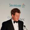 Le prince Harry en plein discours lors d'un dîner de gala à Johannesburg, en Afrique du Sud, le 27 février 2013, au profit de son association Sentebale pour les enfants du Lesotho.