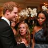 Le prince Harry rencontre les convives d'un dîner de gala à Johannesburg, en Afrique du Sud, le 27 février 2013, au profit de son association Sentebale pour les enfants du Lesotho.
