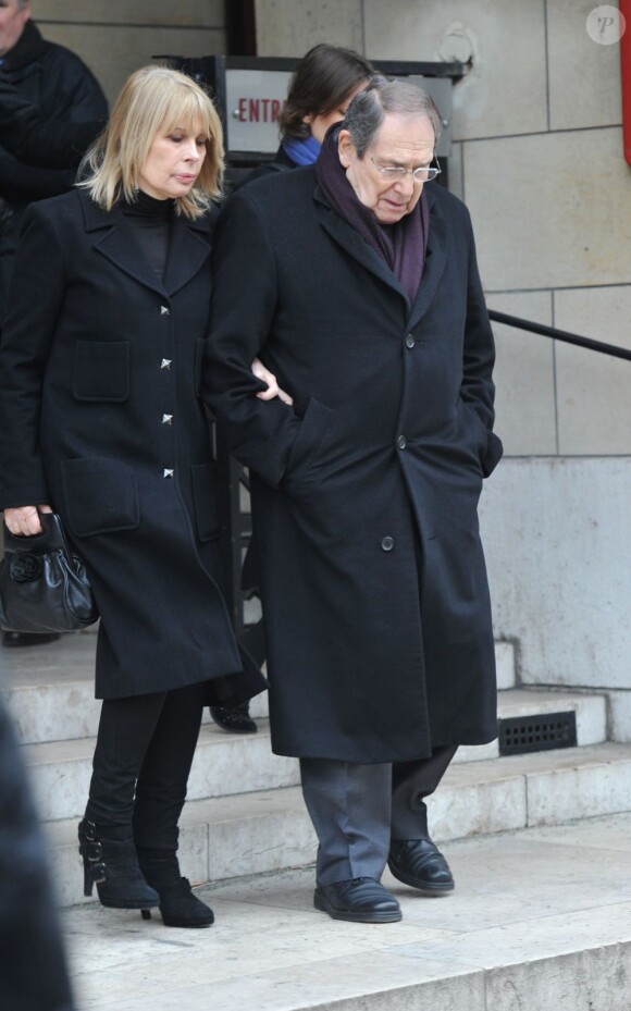 Candice Patou et son mari Robert Hossein aux funérailles de son ami, le photographe Willy Rizzo en l'église Saint Pierre de Chaillot à Paris, le 1er mars 2013.