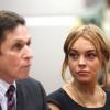 Lindsay Lohan et son avocat Mark Heller au tribunal de Los Angeles, le 30 janvier 2013. Le procès a été repoussé au 18 mars 2013.