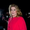 Catherine Deneuve arrive au défilé prêt-à-porter automne-hiver 2013-2014 d'Yves Saint Laurent. Le défilé s'est déroulé au Grand Palais à Paris, le 4 mars 2013.