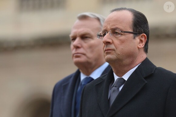 François Hollande et Jean-Marc Ayrault lors de l'hommage national à Stéphane Hessel, à Paris le 7 mars 2013.