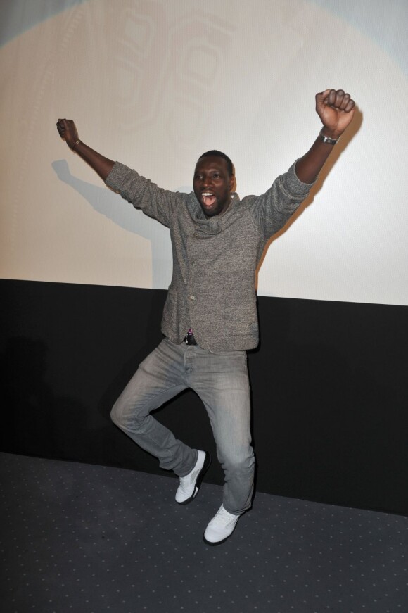 Omar Sy heureux à la première du film De l'autre côté du périph à Berlin le 17 mars 2013.