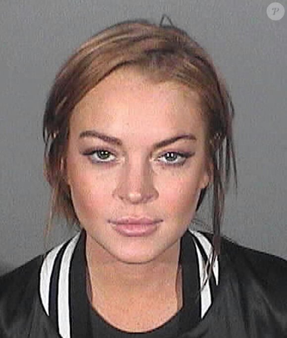 Voici le dernier mugshot de Lindsay Lohan. Un de plus dans sa collection. Le 19 mars 2013.