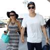 Paris Hilton et son chéri River Viiperi arrivent à l'aéroport de Los Angeles pour prendre un vol, le 20 mars 2013.