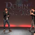 M. Pokora et Dume chantent la comédie musicale Robin des bois lors des Haidressing awards 2013 au carrousel du Louvre à Paris, le 24 mars 2013.