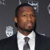 50 Cent très élégant en costume pour assister à la projection de son film All Things Fall Apart à Berlin, le 24 mars 2013.