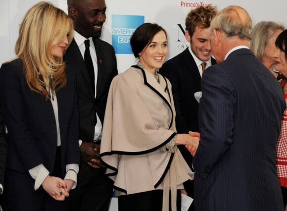Le prince Charles salue Victoria Pendleton lors de la grande soirée des Prince's Trust Awards, le 26 mars 2013 à l'Odeon Leicester Square, à Londres.