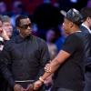 Diddy et Jay-Z en pleine discussion lors du NBA All-Star Game à Houston, le 17 février 2013.