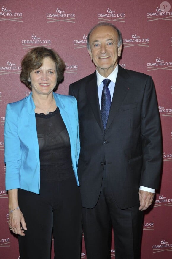 Bertrand Belinguier et sa femme lors de la 64e cérémonie des Cravaches d'Or au Théâtre des Champs-Elysées à Paris le 3 avril 2013.