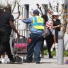 Exclu - Rihanna et son entourage quittant l'aéroport de Los Angeles le 19 avril 2013