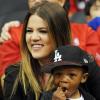 Khloé Kardashian et son filleul Christian Mccray assistent au match entre les Los Angeles Clippers et les Memphis Grizzlies au Staples Center. Los Angeles, le 22 avril 2013.