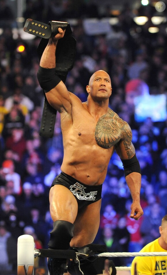 The Rock et son titre de champion le 7 avril 2013.