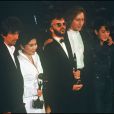  George Harrison, Yoko Ono, Ringo Starr, et Julian et Sean Lennon à Londres, le 22 janvier 1988. 