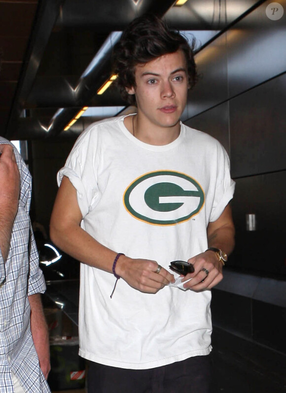 Harry Styles arrivant à l'aéroport de LA pour rejoindre Paris le 27 avril 2013.