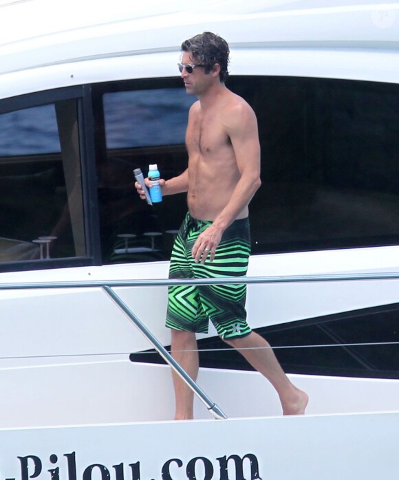Exclusif - NO WEB - NO BLOG - Patrick Dempsey en famille sur un yacht aux Caraïbes  For germany call for price - Please hide children face prior publication Exclusive - Patrick Dempsey and his family go for a swim off a yacht on May 17, 2013 while vacationing in the Caribbean. After cooling off in the water, Patrick swam back on board and rubbed sunscreen all over his wife Jill! NO INTERNET USE WITHOUT PRIOR AGREEMENT17/05/2013 - Caraibes