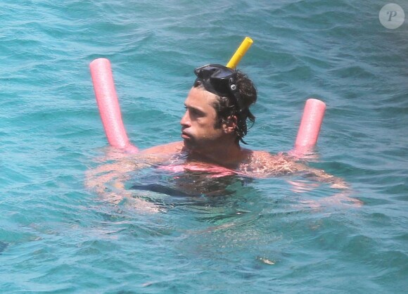 Exclusif - NO WEB - NO BLOG - Patrick Dempsey en famille sur un yacht aux Caraïbes  For germany call for price - Please hide children face prior publication Exclusive - Patrick Dempsey and his family go for a swim off a yacht on May 17, 2013 while vacationing in the Caribbean. After cooling off in the water, Patrick swam back on board and rubbed sunscreen all over his wife Jill! NO INTERNET USE WITHOUT PRIOR AGREEMENT17/05/2013 - Caraibes