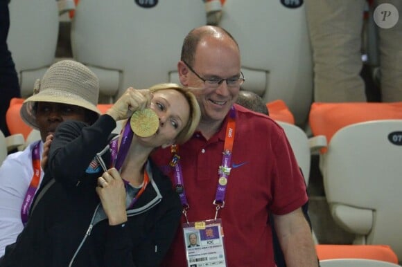 Prince Albert II of Monaco and Princess Charlene of Monaco following the south African swimming team inside the aquatic center during the London Olympic games in London, UK on July 31, 2012. Photo by Guibbaud-Gouhier-JMP/ABACAUSA.COM01/08/2012 - 