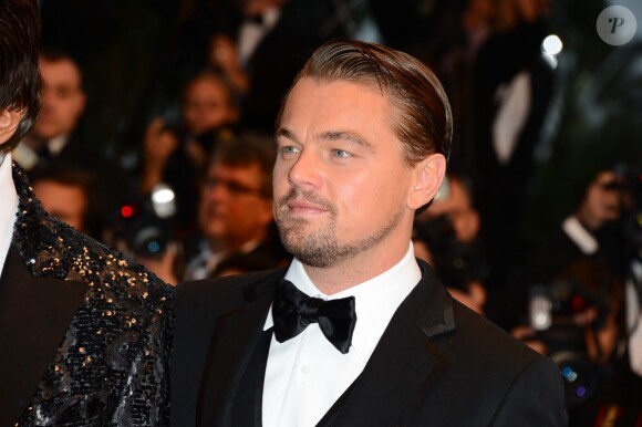 Leonardo DiCaprio à la montée des marches de Gatsby le Magnifique en cérémonie d'ouverture du Festival de Cannes, le 15 mai 2013.