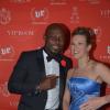 Lorie et Jimmy Jean-Louis rieurs à la soirée d'ouverture du VIP Room à Cannes le 15 mai 2013.