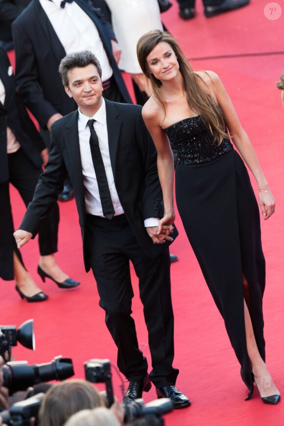 Thomas Langmann et Céline Bosquet sur le tapis rouge du Palais des Festivals pour la projection du film Le Passé, à la 66e édition du Festival de Cannes, le 17 mai 2013.