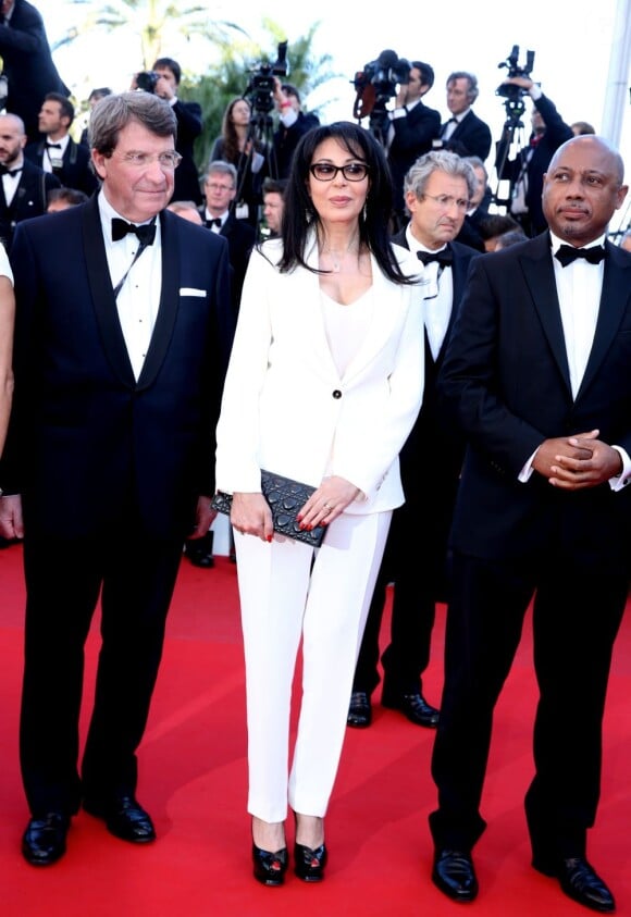 Xavier Darcos et la ministre Yamina Benguigui lors de la montée des marches du film Le Passé, lors du 66 eme Festival de Cannes, le 17 mai 2013